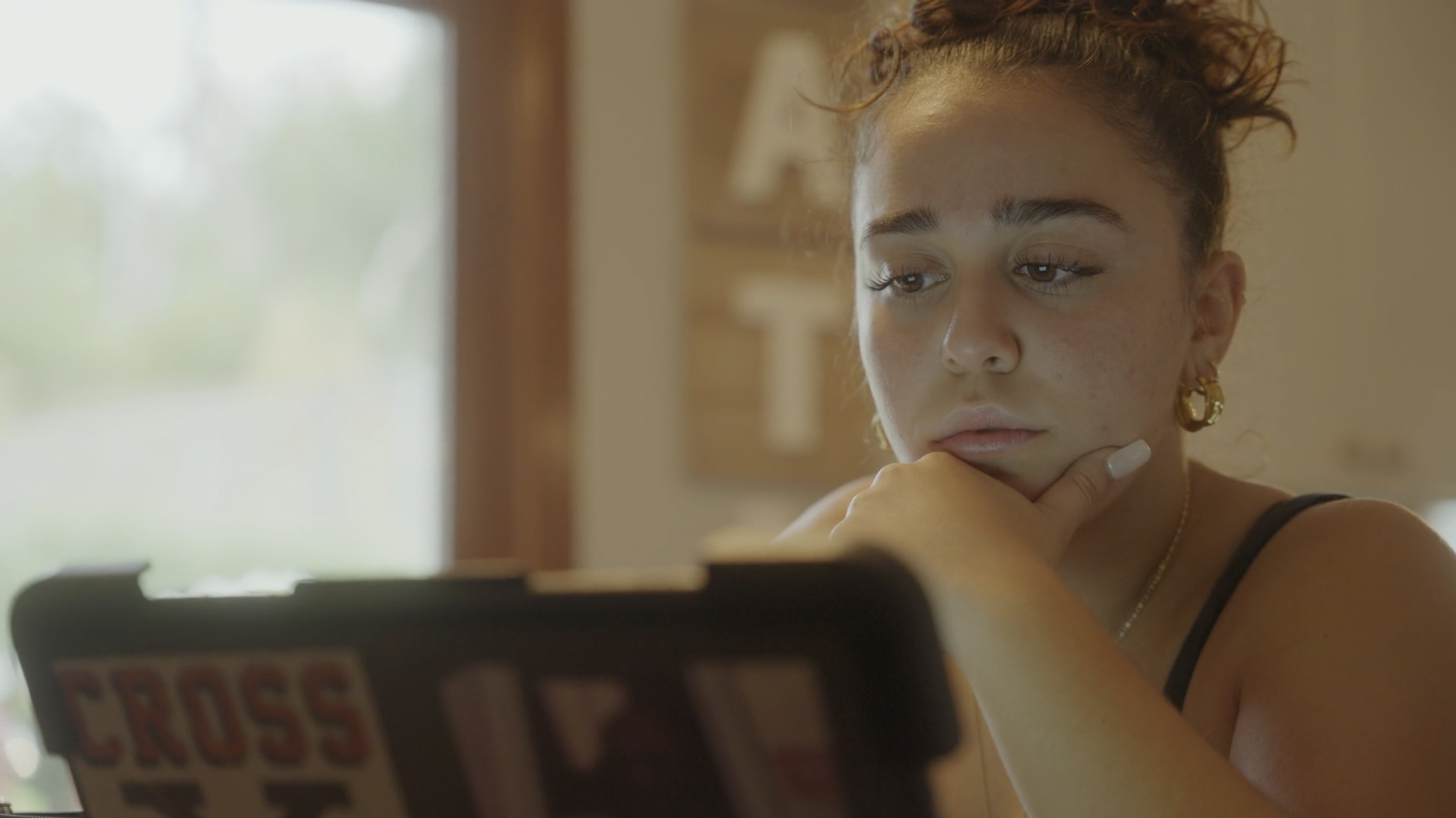 Learner looking at laptop